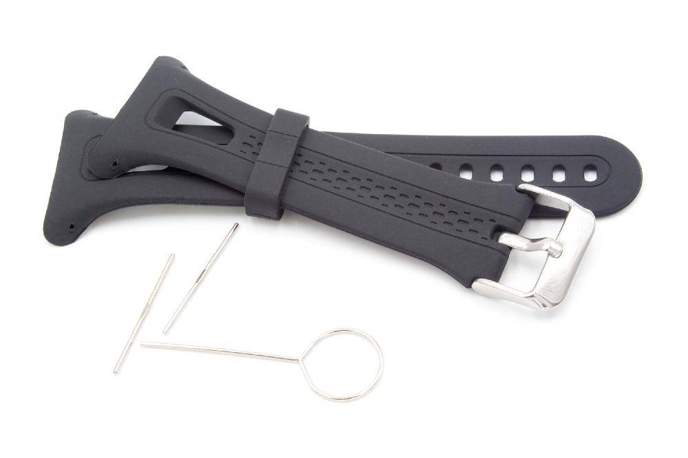Ein schwarzes Uhrenarmband mit einer silbernen Schnalle liegt flach ausgebreitet. Daneben befinden sich zwei dünne Metallstäbe und ein Werkzeug mit einer Schlaufe am Ende.