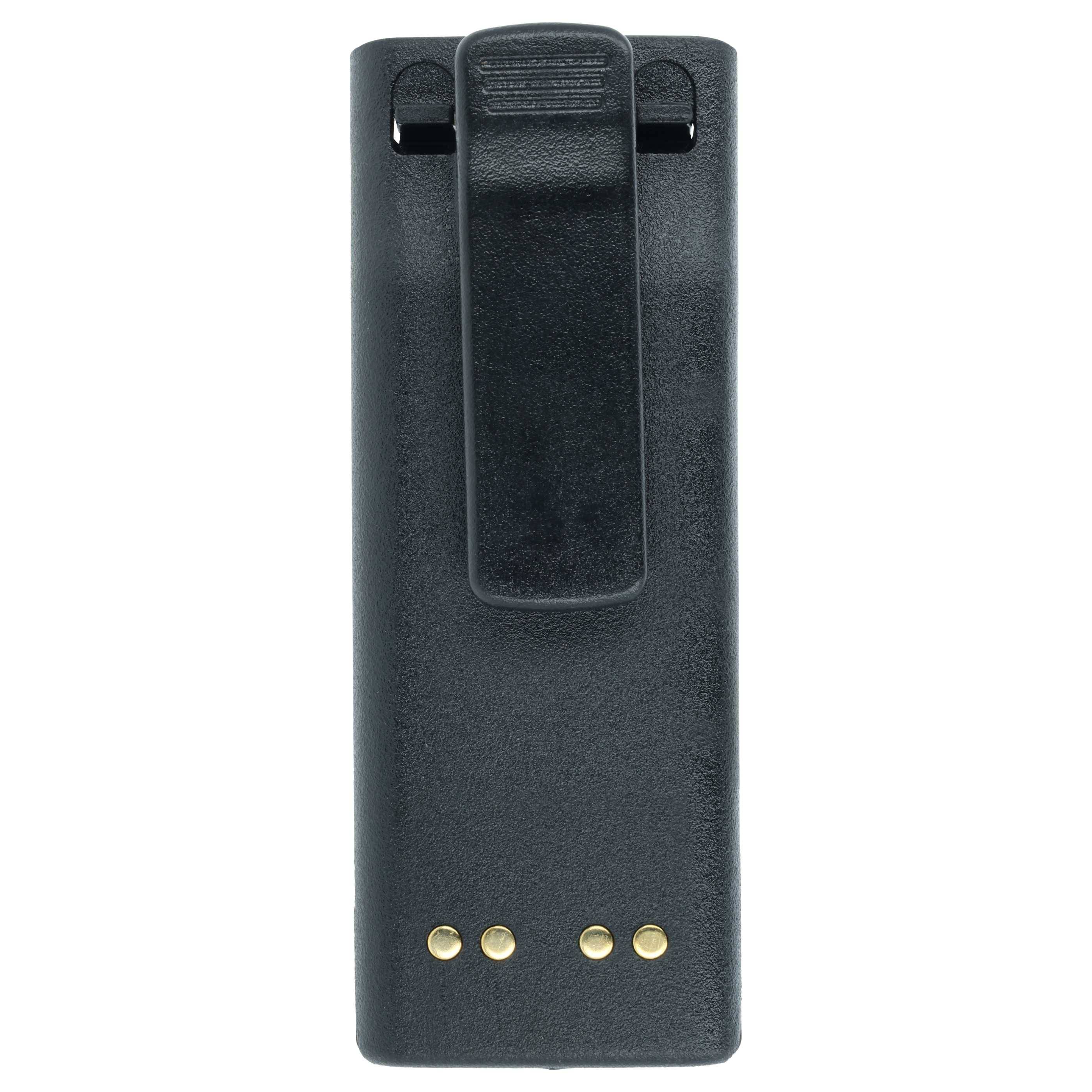 Eine schwarze, rechteckige Klemmvorrichtung mit drei metallischen Kontakten am Boden, wahrscheinlich zum Anschluss an ein tragbares Gerät oder Zubehör.