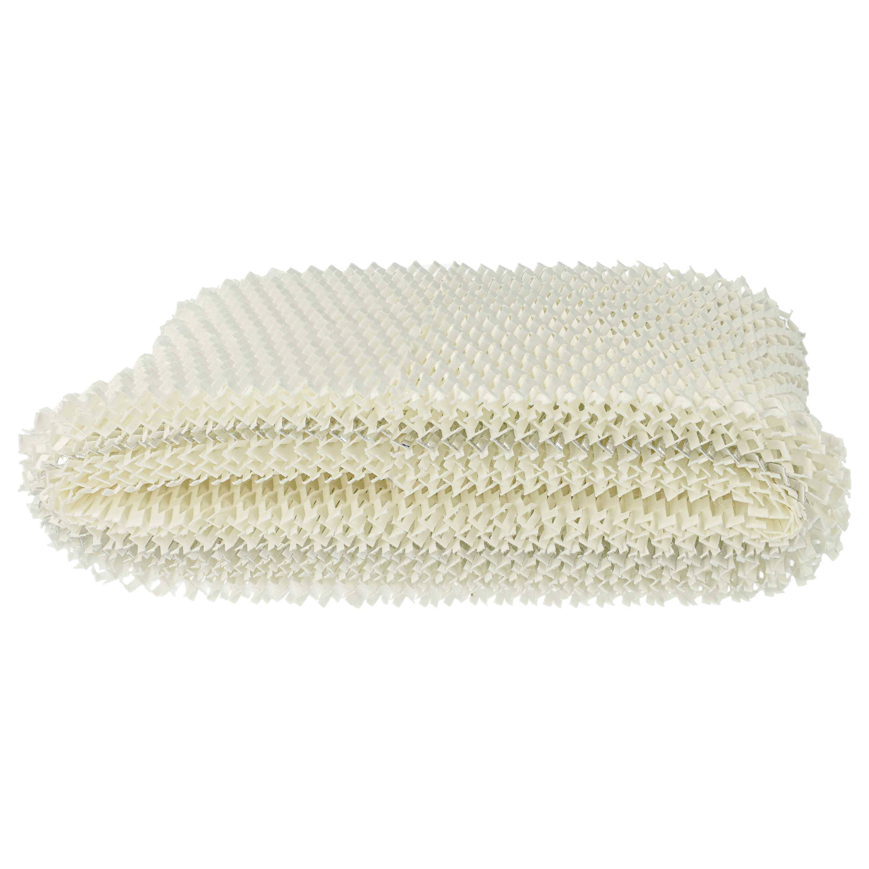 Eine gefaltete, strukturierte, cremefarbene Waffelmuster-Decke oder ein Textil.