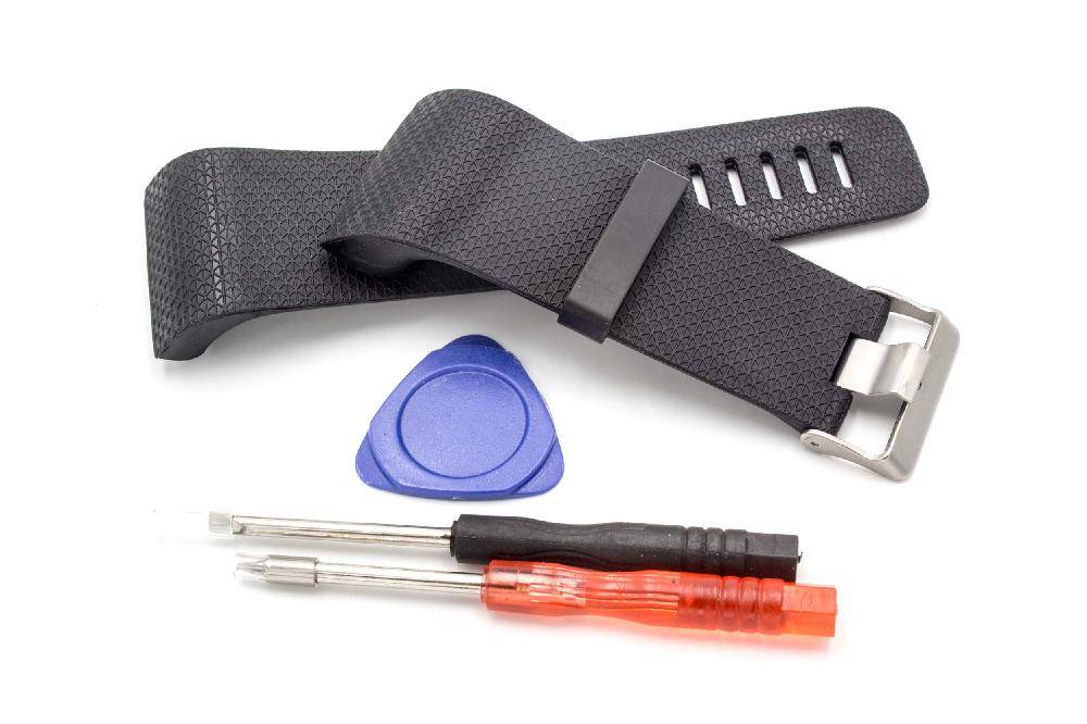 Ein Ersatz-Uhrenarmband in Schwarz mit silberner Schnalle, begleitet von einem blauen Plektrum und zwei kleinen Schraubendrehern, einem roten und einem schwarzen.