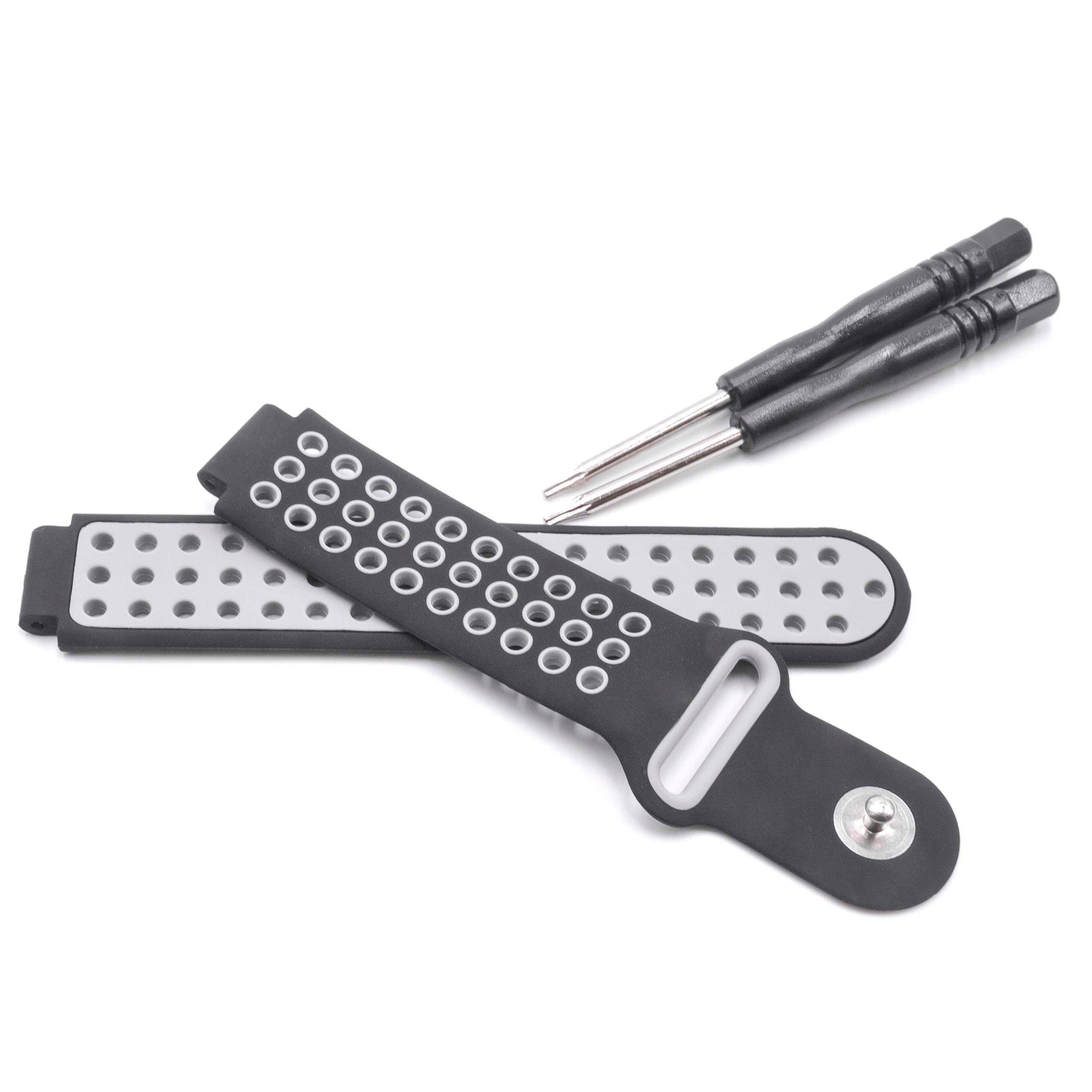 Schwarz-grau perforiertes Silikon-Armband mit Metallstift-Befestigung und zwei kleinen Schraubenziehern.