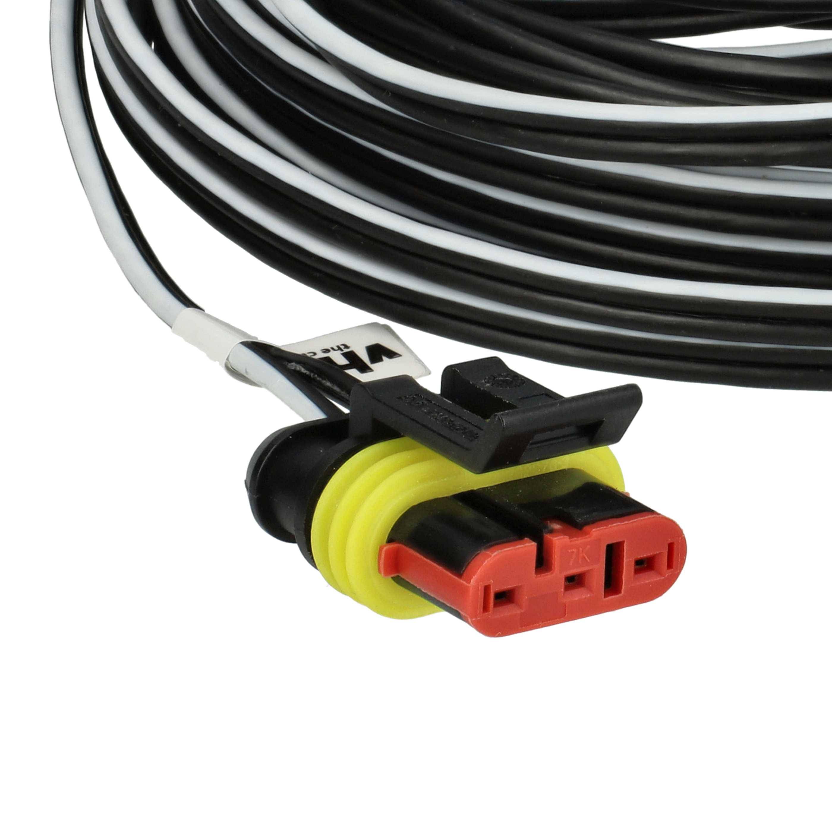 Ein gewickelter schwarzer Kabel, der mit einem roten und schwarzen elektrischen Stecker verbunden ist und einen gelben Dichtungsring aufweist, der für die Fahrzeugverkabelung verwendet wird.