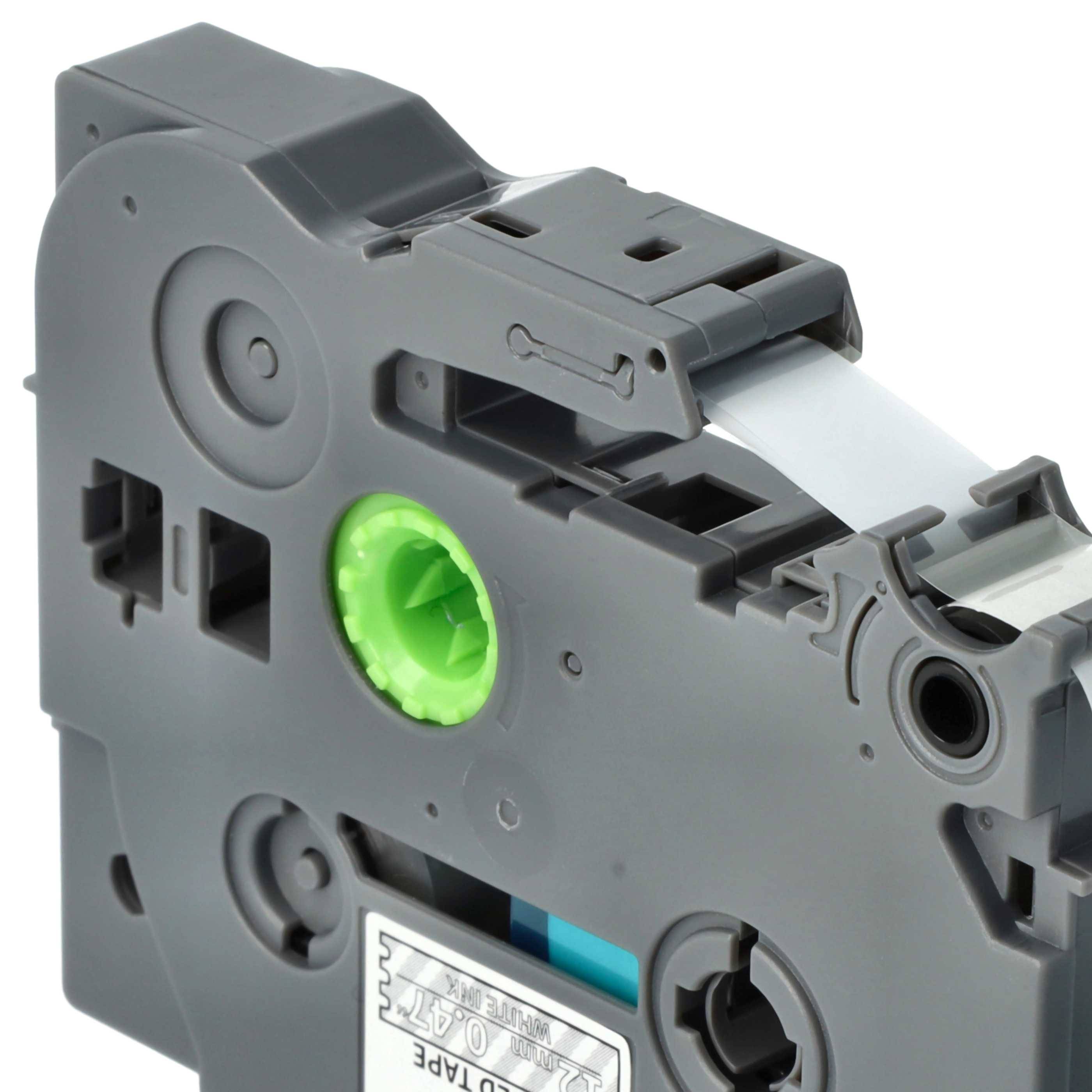 Eine schwarz-grau beschriftete Etikettendruckerpatrone mit einer sichtbaren Rolle aus weißem Etikettenband, ausgestattet mit einer grünen Spule und komplizierten Kunststoffmechanismen.