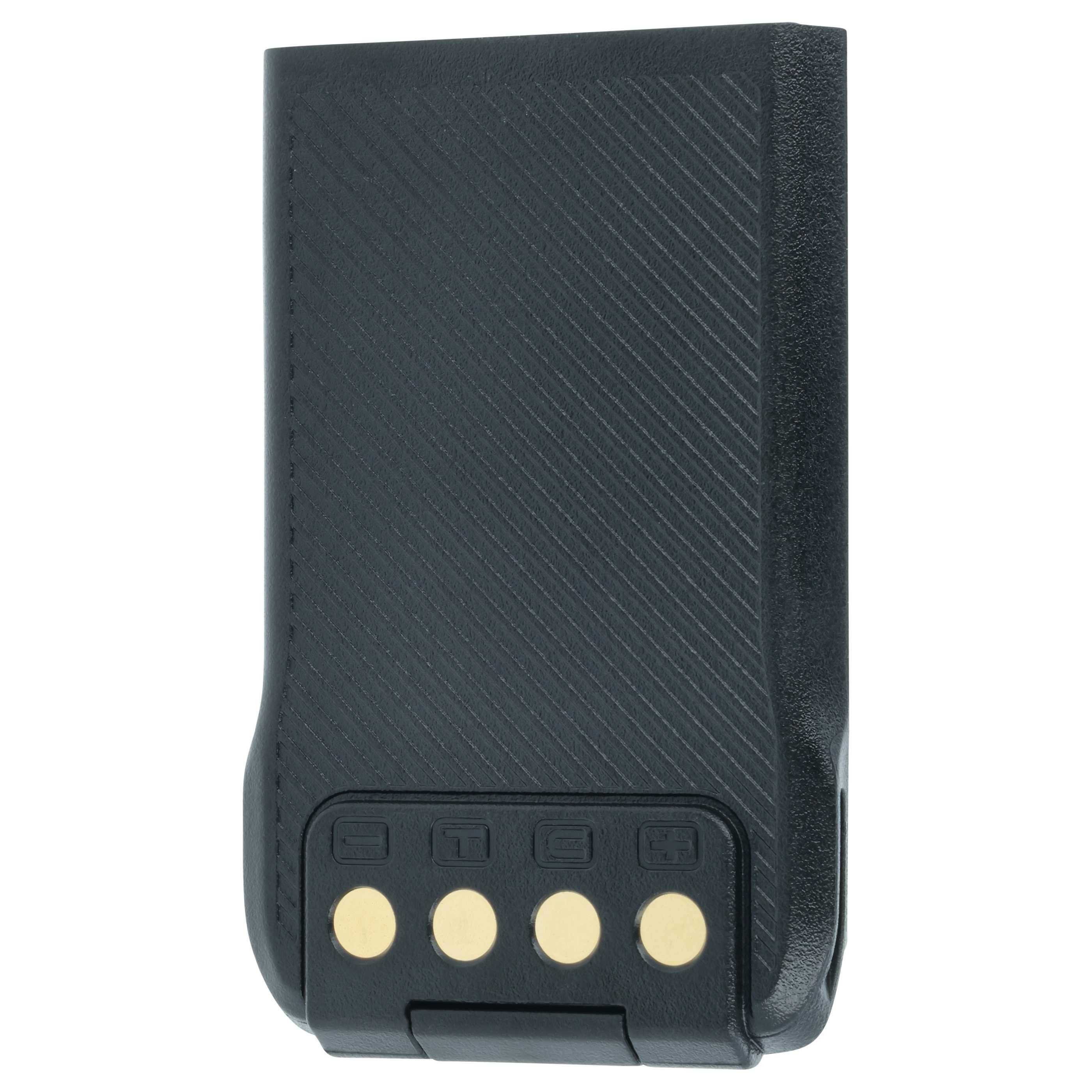 Eine Nahaufnahme eines schwarzen Pagers mit einer strukturierten Oberfläche und vier runden goldenen Kontakten am unteren Ende.