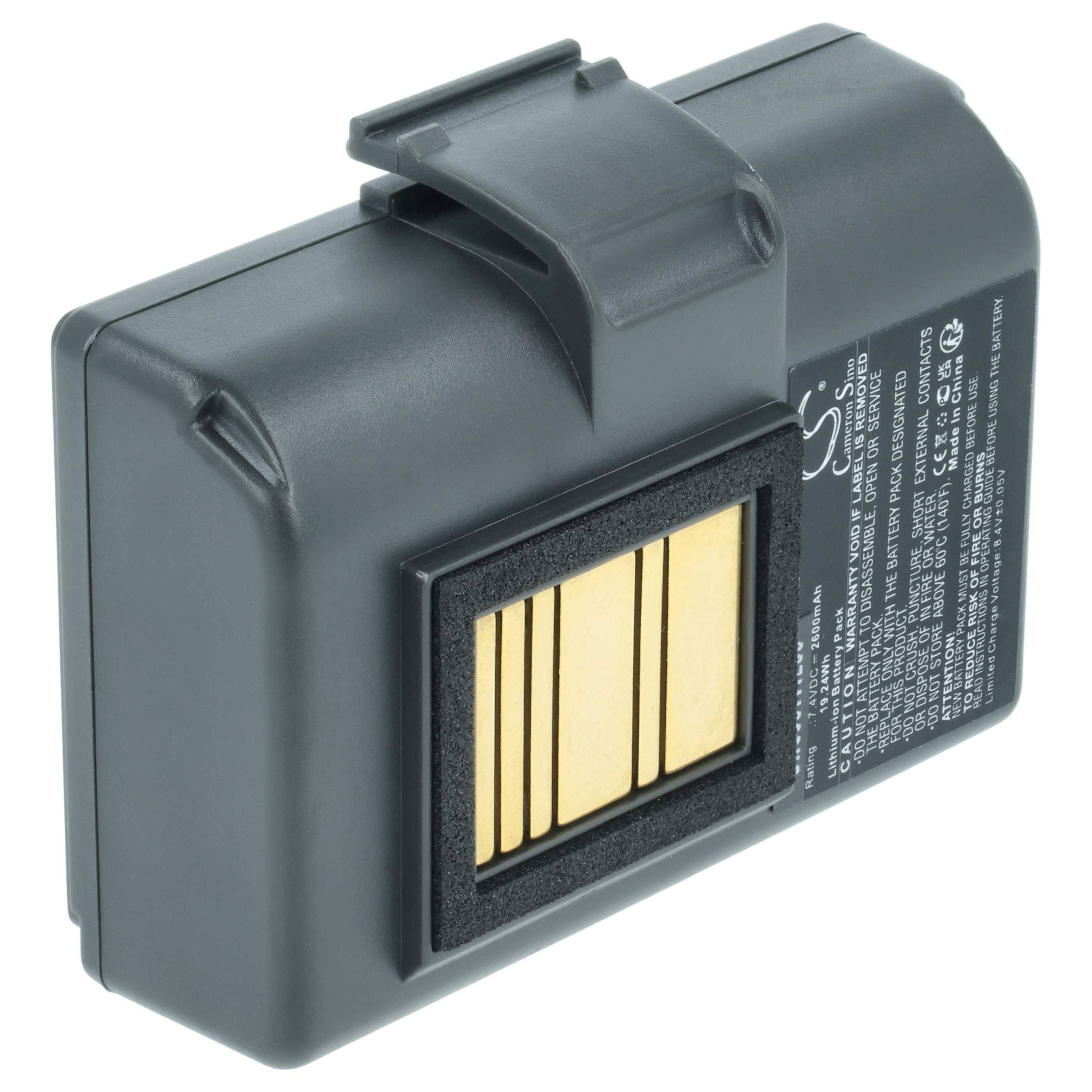 Eine schwarze Kamera-Batterie mit einem Satz goldener Kontakte und einem Kunststoff-Verschluss oben. Technische Details auf einer Seite gedruckt.