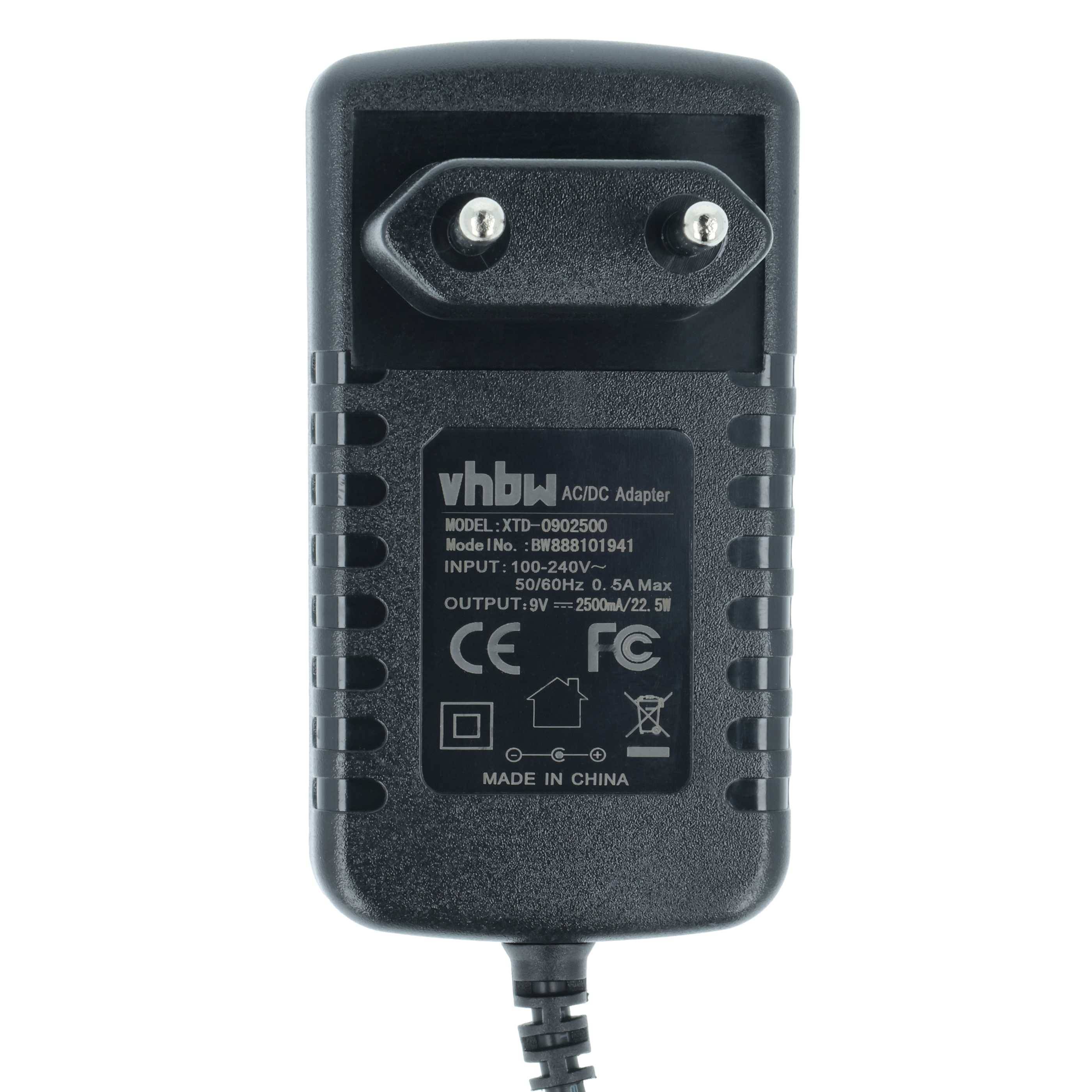 Ein schwarzer AC/DC-Adapter mit Steckervorsprüngen und Kabel. Text lautet: 'vhbw AC/DC-Adapter Modell: XTD-0902500 EINGABE: 100-240V ~ 50/60Hz, 0,5A Max AUSGABE: 9V 2500mA/22,5W HERGESTELLT IN CHINA