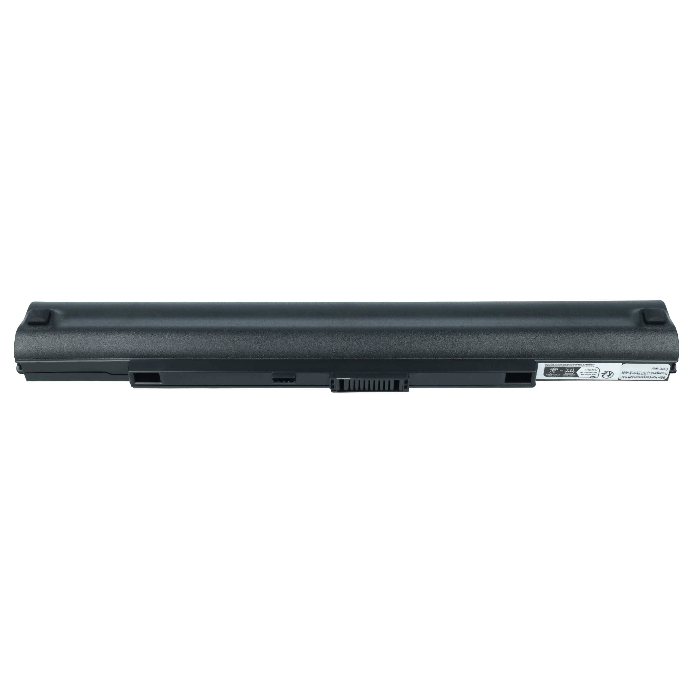 Eine schwarze Laptop-Batterie mit sichtbaren Anschlüssen an einer Seite und einem Etikett mit technischen Spezifikationen auf der Oberfläche.