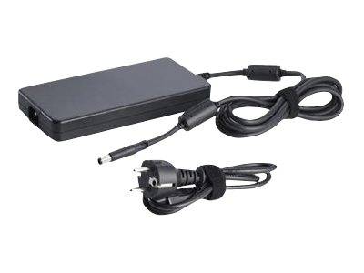 Schwarzer Laptop-Stromadapter mit angeschlossenem Gleichstromstecker und gewickeltem Stromkabel auf weißem Hintergrund