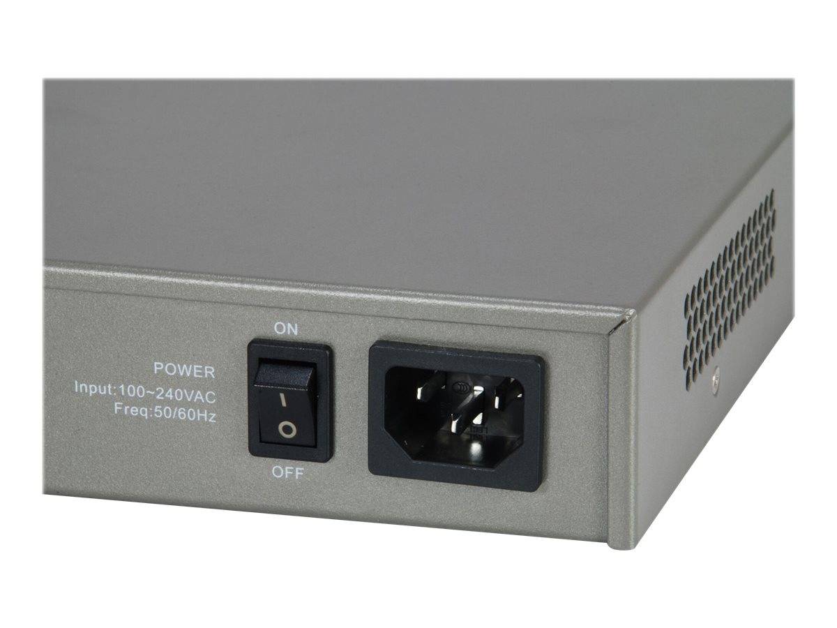 Nahaufnahme eines grauen elektronischen Stromversorgungsgeräts mit einem Ein-/Ausschalter, einer Wechselstromeingangsbuche und einem Belüftungsgitter.
