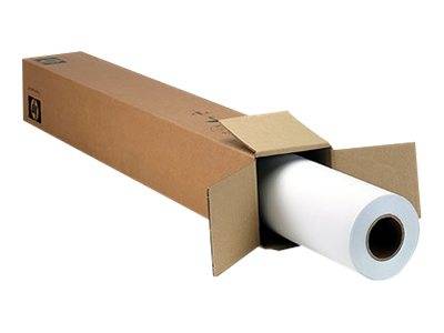 Eine große Rolle weißes Papier, teilweise aus einem langen Kartonversandkarton entnommen.