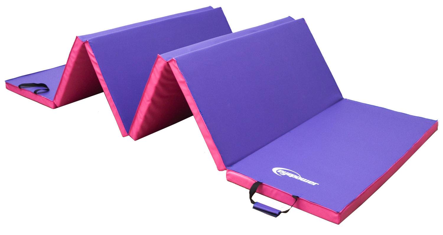 Violette und rosa Faltschaumstoffmatte in Zickzackform mit Tragegriff angeordnet.