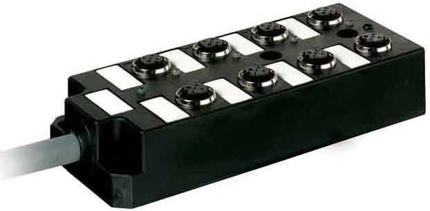 Ein schwarzes rechteckiges elektronisches Gerät mit mehreren runden Anschlüssen auf der Oberseite, das für industrielle Konnektivitätszwecke verwendet wird.