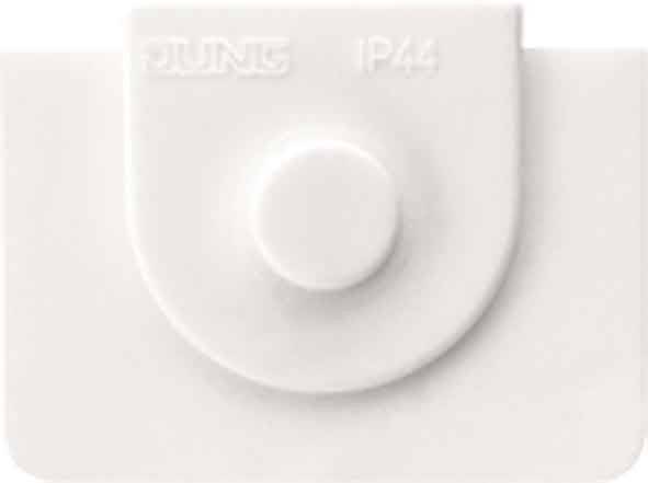 Ein weißer Plastikdeckel mit einem kreisförmigen Knopf und geprägtem Text: JUNG IP44.