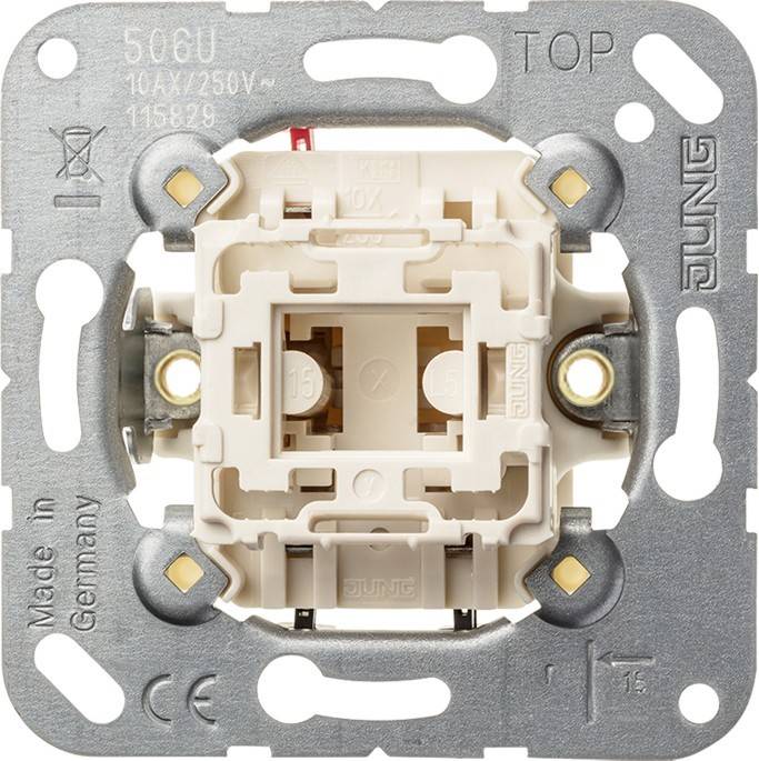 Ein Lichtschalterrahmen mit Schrauben, gekennzeichnet mit '506U', '10AX/250V', zur Angabe der elektrischen Spezifikationen, und 'Made in Germany'.