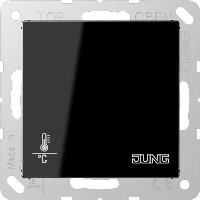 Ein schwarzer quadratischer elektronischer Schalter mit einem Temperatur-Symbol und dem 'JUNG' Logo, montiert auf einer Metallhalterung. Geeignet zur Steuerung der Heizung.