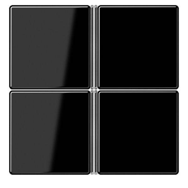 Vier glänzend schwarze quadratische Paneele, die in einem 2x2 Rastermusster angeordnet sind.