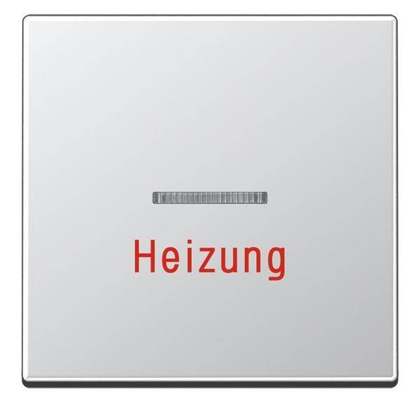 Ein quadratischer weißer Knopf mit rotem Text ‚Heizung' deutet auf eine Heizungsteuerung hin.