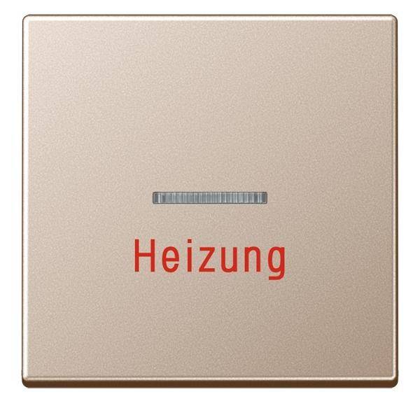 Ein beige farbener quadratischer Schalter mit roter Aufschrift 'Heizung', der eine Heizungssteuerung anzeigt.