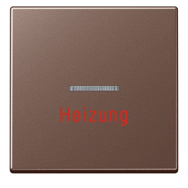 Eine braune quadratische Taste mit dem Wort 'Heizung' in Rot unterhalb einer horizontalen silbernen Linie, die einen Heizungssteuerungsschalter anzeigt.