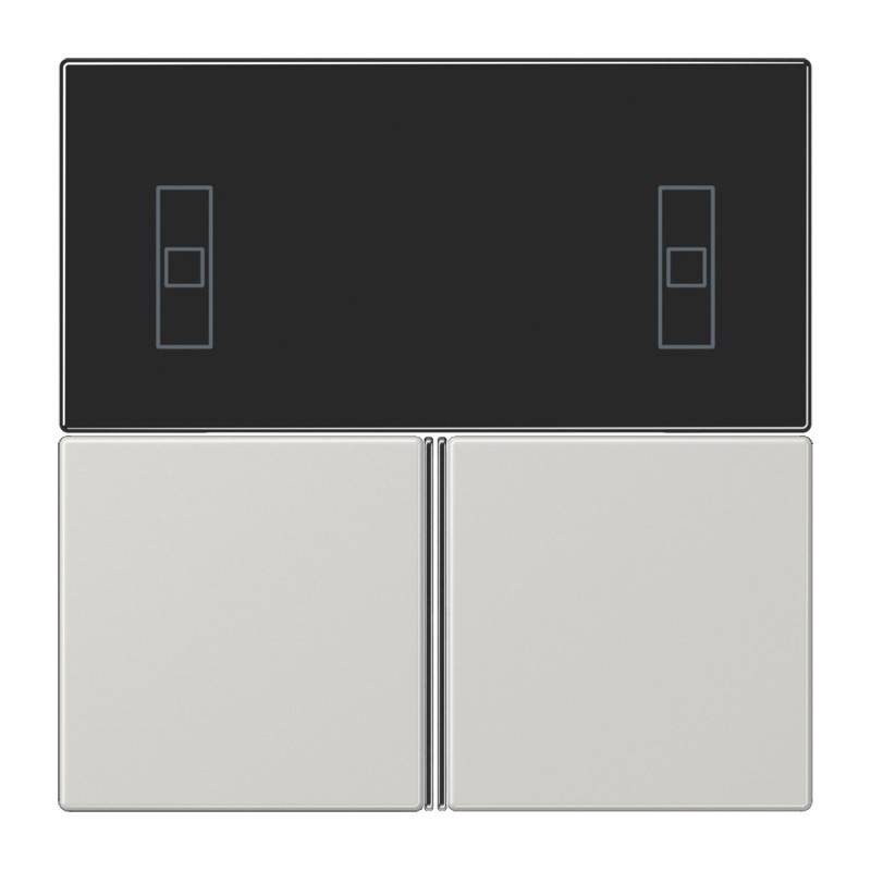 Modernes Wandschalter-Panel mit zwei großen silbernen Tasten unterhalb eines schwarzen Touch-Panels und kleinen Indikator-Symbolen.