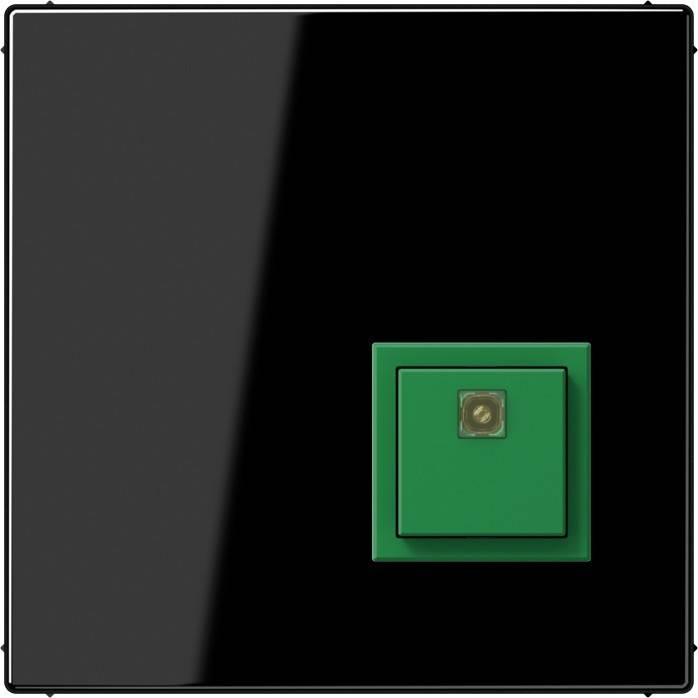 Ein grüner quadratischer Knopf ist auf einem schwarzen quadratischen Panel zentriert. Der Knopf hat ein kleines, hellgefärbtes Quadrat in der Mitte.