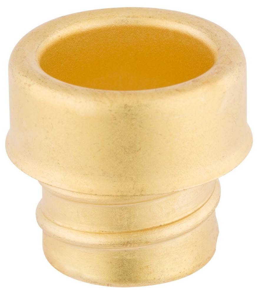Eine kleine, runde, goldene Kappe mit glatter Oberfläche und vertiefter Oberseite.