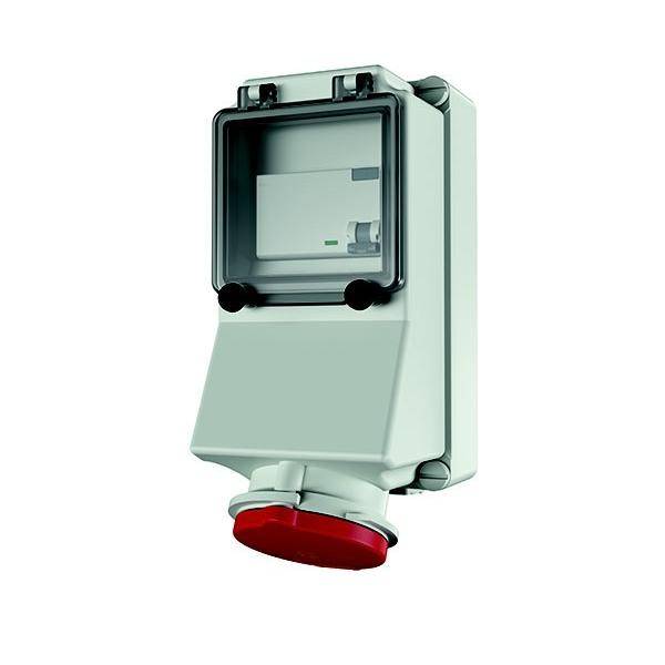 Ein wandmontiertes Gerät mit transparenter Abdeckung und rotem Untenknopf. Für industrielle oder elektrische Zwecke verwendet.