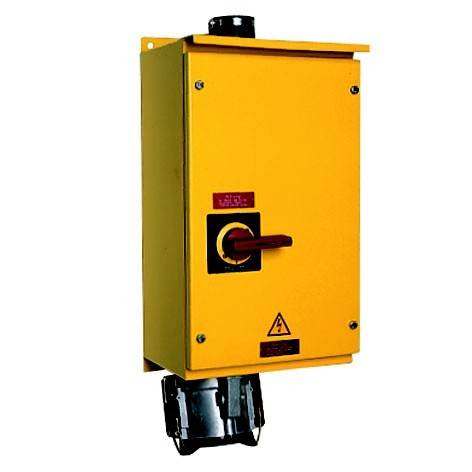 Gelbe industrielle elektrische Schalttafel mit rotem Drehschalter und Warnsymbol, montiert auf einer schwarzen Basis.