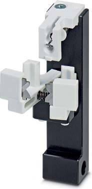 Nahaufnahme einer federnden Klemme, die an einer vertikalen schwarzen Metalloberfläche befestigt ist und dazu ausgelegt ist, dünne Gegenstände wie Blätter oder Etiketten sicher zu halten.