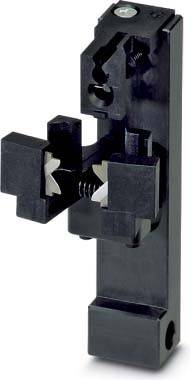 Eine Nahaufnahme einer schwarzen mechanischen Klemme mit metallischen Backen, die ihren Federmechanismus zeigt. Sie wird verwendet, um Objekte an ihrem Platz zu sichern.