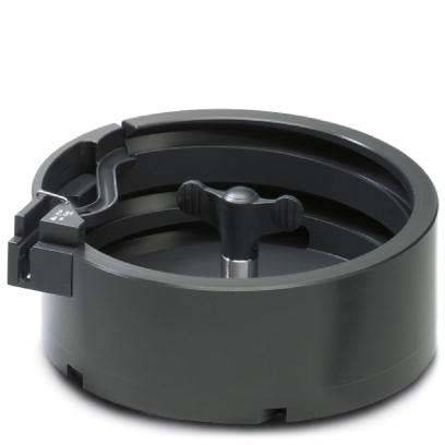 Eine schwarze, runde mechanische Komponente mit einem zentralen Knopf und Rillen, möglicherweise ein Teil für Maschinen- oder elektronische Ausrüstung.