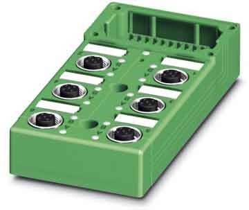 Ein grünes elektronisches Gerät mit acht kreisförmigen Anschlüssen, wahrscheinlich für industrielle oder technische Anwendungen verwendet.
