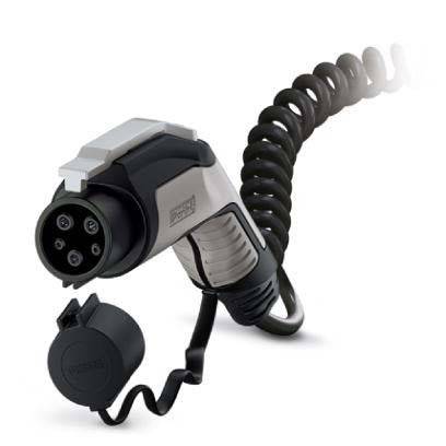 Ein aufgerolltes Ladekabel für Elektrofahrzeuge mit einem Typ-1-Anschluss, konzentriert auf das Ende mit sichtbaren Kontaktstiften, das zum Aufladen von Elektroautos verwendet wird.