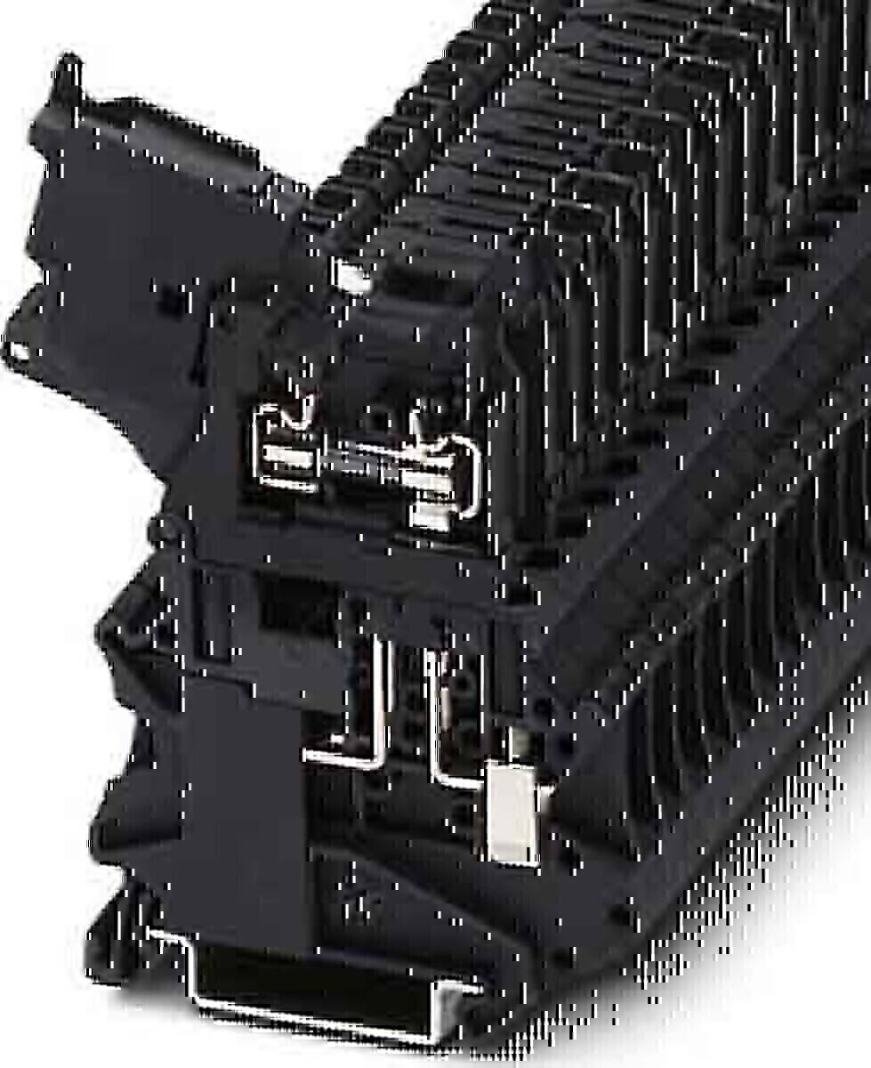 Nahaufnahme eines schwarzen mechanischen Bauteils, höchstwahrscheinlich eine industrielle Komponente, die eine detaillierte Anordnung von Schlitzen und Anschlüssen zeigt.