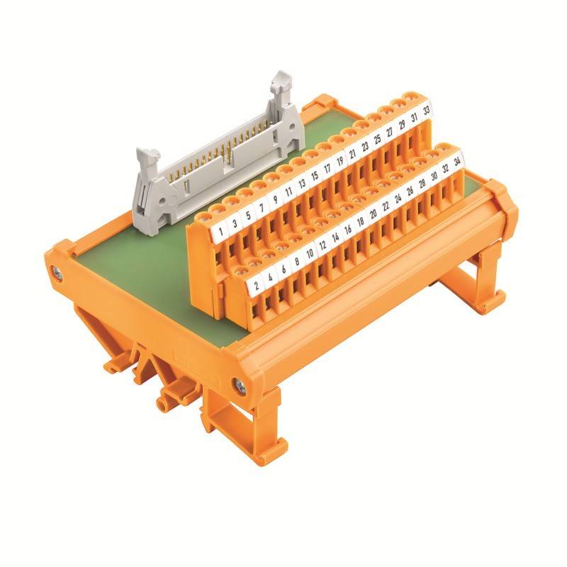 Ein orangefarbener elektrischer Klemmenblock mit nummerierten Anschlüssen, der zum Organisieren und Verbinden von Leitungen in einer Schaltung verwendet wird.