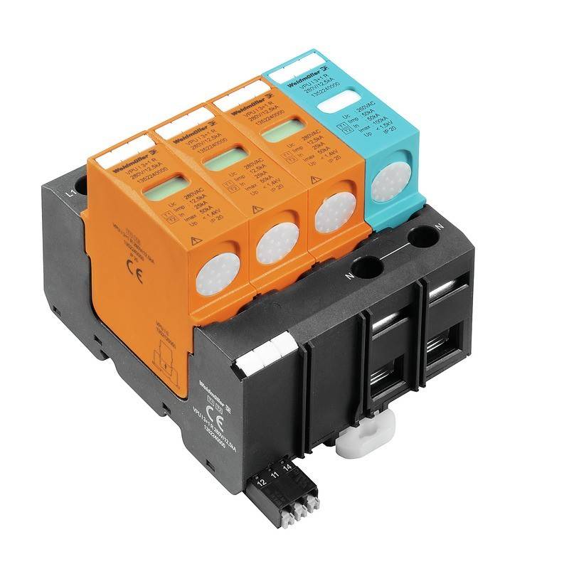 Ein modulares Industriegerät mit vier Modulen: drei orangefarbene und ein blaues, möglicherweise für elektrische Steuerung oder Schutzschaltungen.