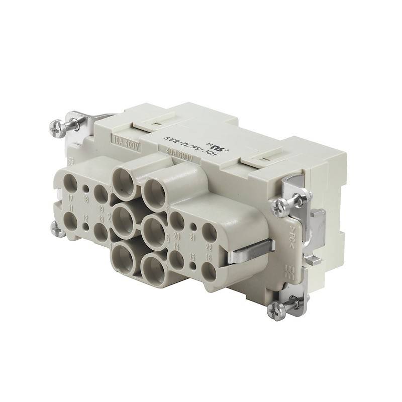 Ein beiger, rechteckiger elektrischer Anschluss mit mehreren kreisförmigen Anschlüssen, die in einem Gittermuster angeordnet sind und mit Metallhalterungen befestigt sind.