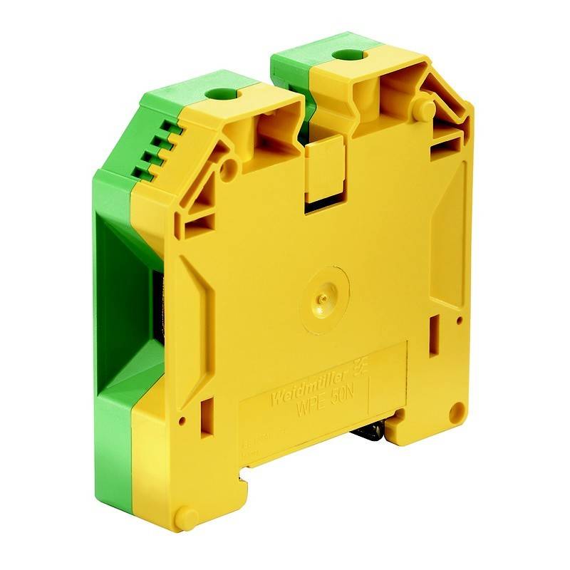 Ein gelber und grüner elektrischer Anschlussblock, der zur Verbindung von Leitungen in elektrischen Installationen verwendet wird.