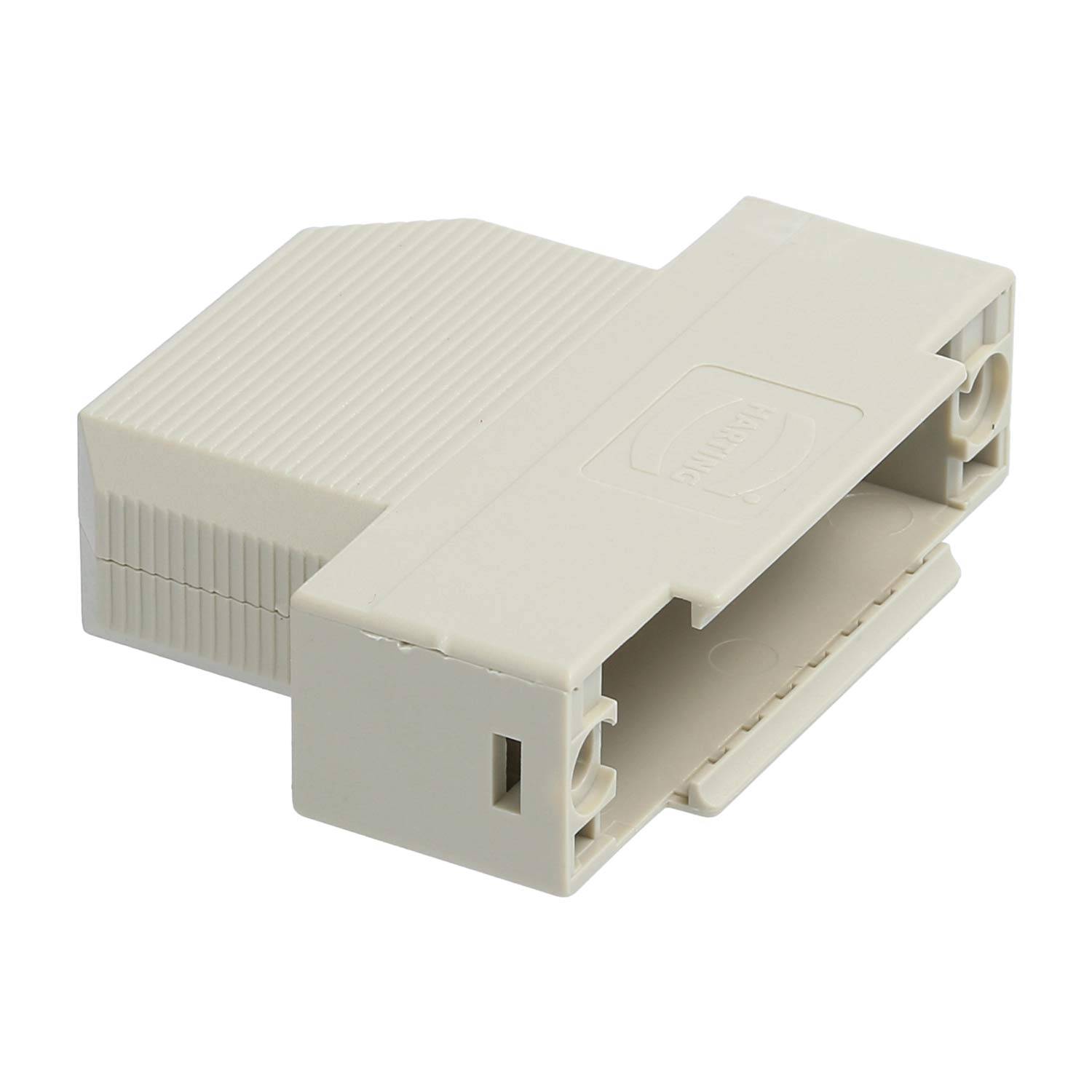 Ein Winkeladapter mit beigefarbener Kunststoffaußenseite, der zwei parallele Schlitze für Kabelverbindungen aufweist, wahrscheinlich für Netzwerk- oder Telekommunikationszwecke verwendet.