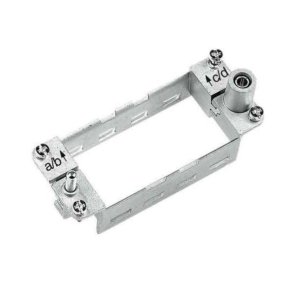 Metall-Montageklammer für die Unterbringung elektrischer Leitungen, mit vier Schrauben zur Befestigung und einer beschrifteten Anleitung mit 'a/b' und 'c/d'.