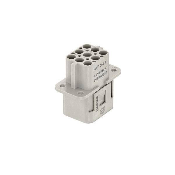 Ein grauer rechteckiger elektrischer Stecker mit mehreren runden Stiftsockeln oben und einem seitlichen Verriegelungsmechanismus, der für Kabelverbindungen verwendet wird.