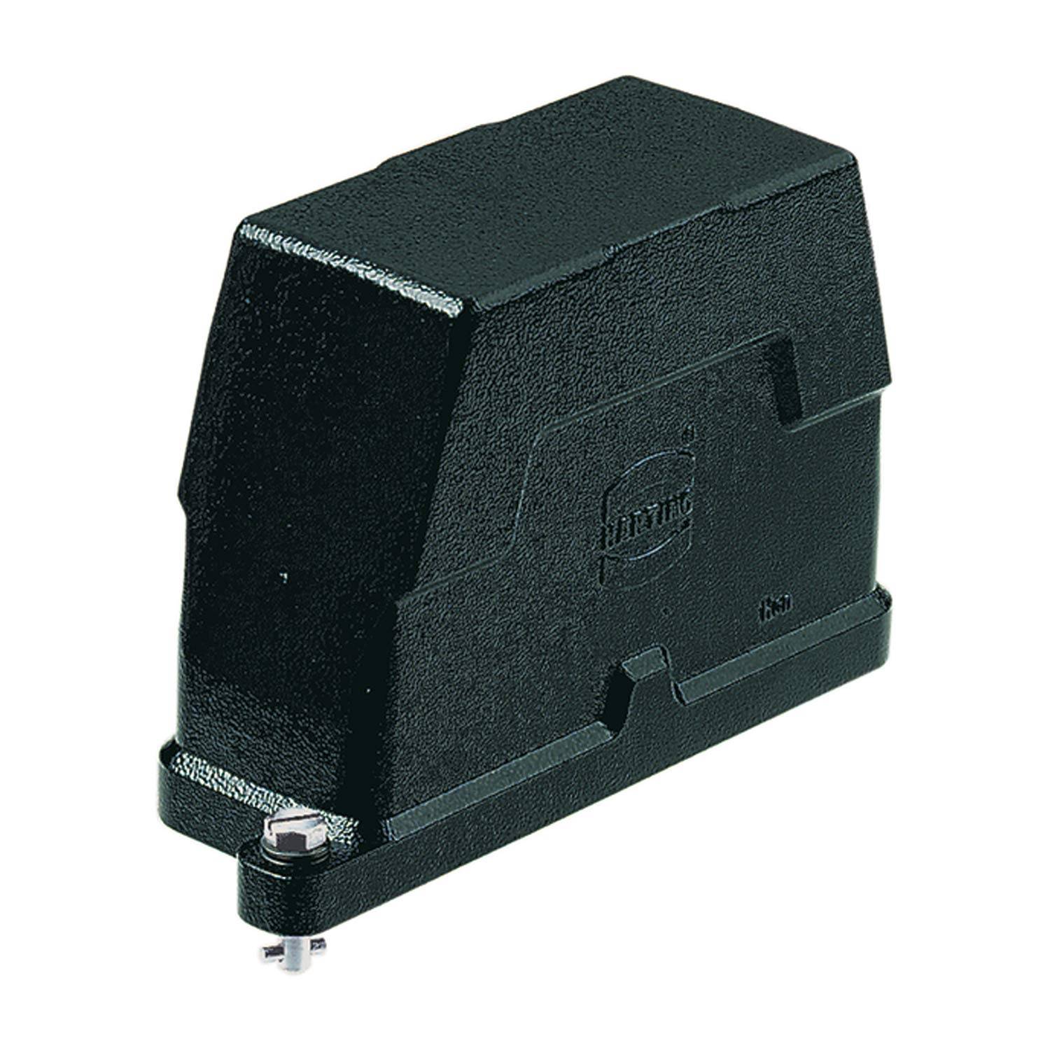 Ein schwarzes, robustes Industriebauteil, möglicherweise ein Gehäuse oder eine Abdeckung, mit strukturierter Oberfläche und einer kleinen metallischen Befestigung an der Basis.
