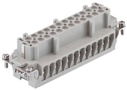 Ein grauer Elektroklemmenblock mit mehreren Anschlusspunkten, der zum Sichern und Verbinden von Kabeln in elektrischen Systemen verwendet wird.