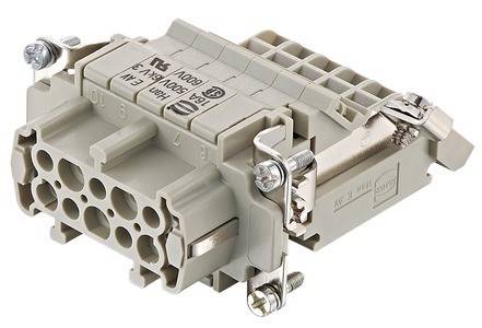 Eine Nahaufnahme eines rechteckigen elektrischen Anschlussblocks mit mehreren Steckplätzen und Befestigungsschrauben, verwendet für industrielle Kabelverbindungen.