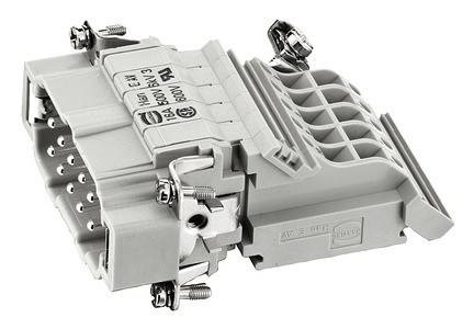 Ein grauer Industrieanschluss mit mehreren Pins und sicheren Metallklemmen, konzipiert für robuste elektrische Anwendungen.