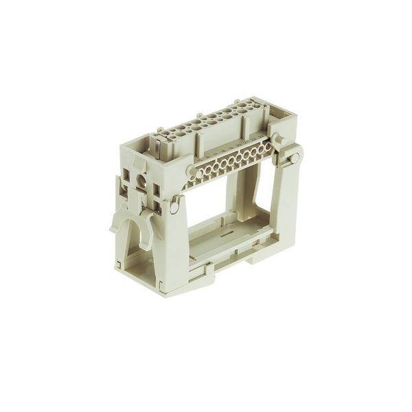 Ein beiger modularer Anschlussgehäuse mit mehreren Schlitzen und Öffnungen, geeignet für die Aufnahme elektrischer Komponenten in industriellen Umgebungen.