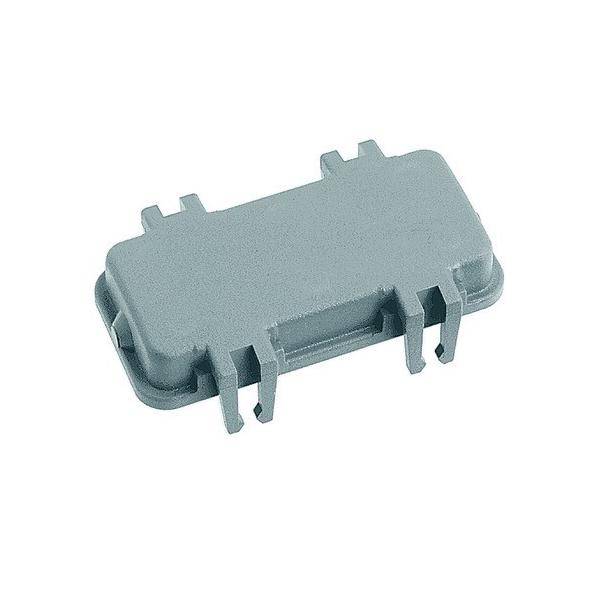 Eine graue rechteckige elektronische Komponente mit sechs Anschlüssen, die typischerweise in Leiterplatten verwendet wird.