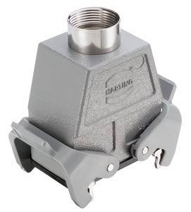 Ein Metallindustrieteil mit einer zylindrischen Öffnung oben und seitlichen Verriegelungen. Es scheint Teil eines Verbindungs- oder Anschlusssystems zu sein.