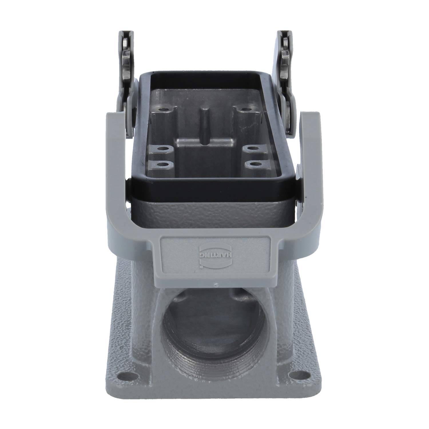 Ein robustes, grau metallisches Steckgehäuse mit rechteckiger offener Oberseite und seitlich angebrachten Spannhebeln zur sicheren Befestigung.