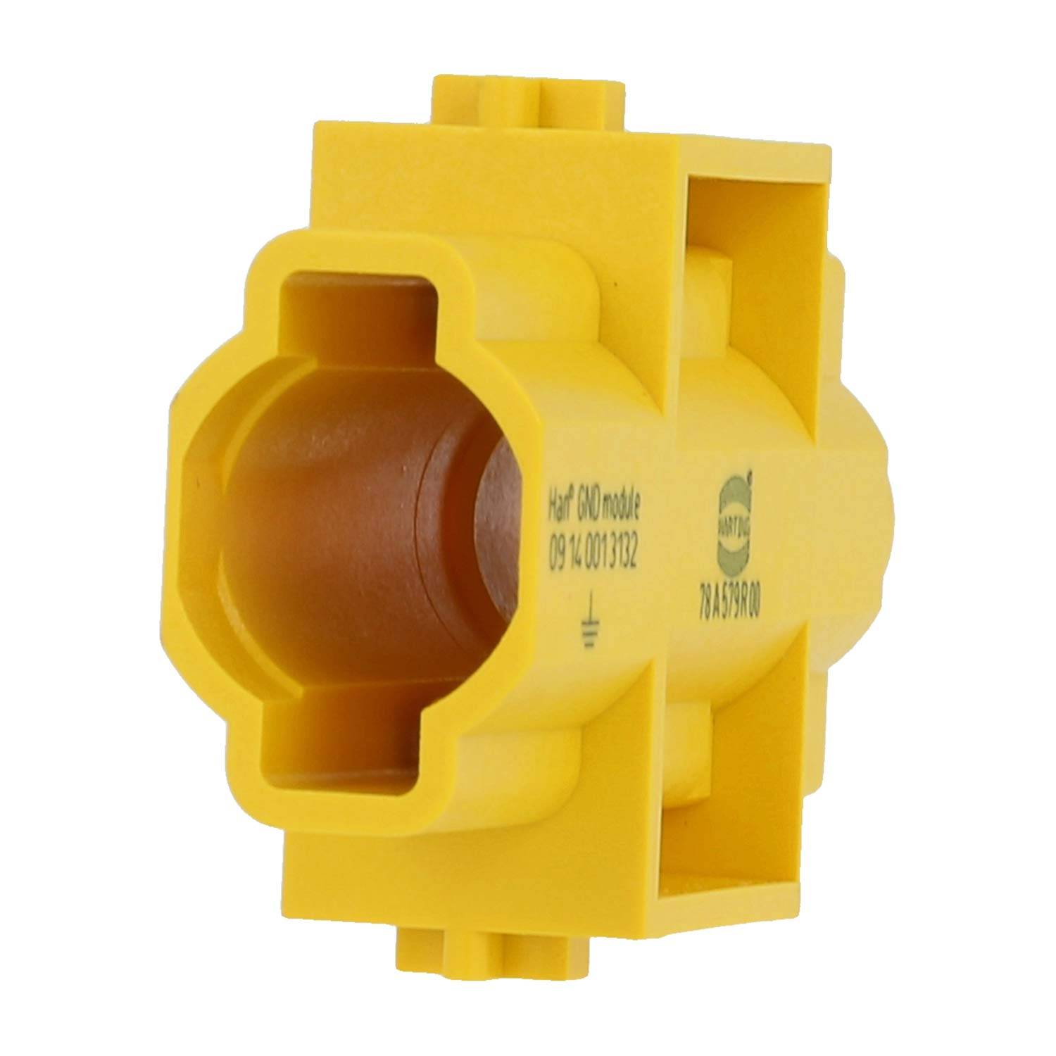 Eine gelbe, zylindrische Kunststoffkomponente mit hohlem Mittelteil und vorstehenden Kanten, beschriftet mit kleinem Text.